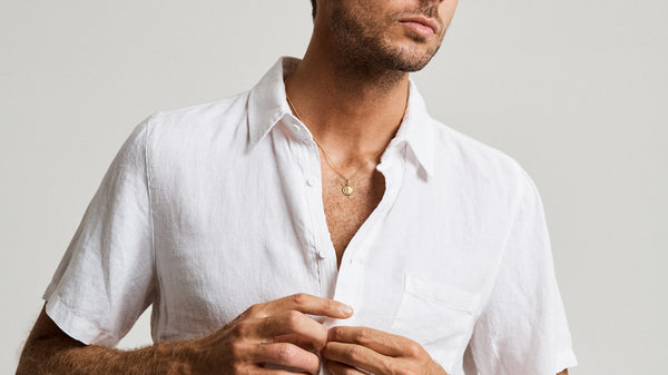 male in white short sleeve linen shirt